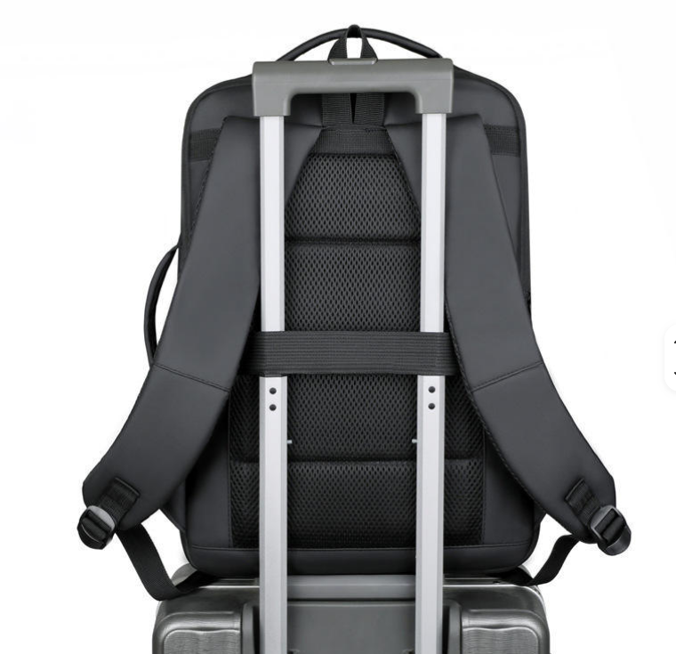 Backpack mounted on a rolling suitcase handle